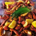 Crawfish boil potatoes cooked in seasoned water, ready to serve at a Louisiana gathering.